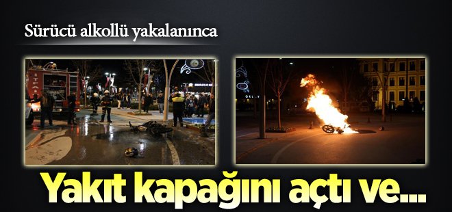 Alkollü yakalanan sürücü motosikletini ateşe verdi
